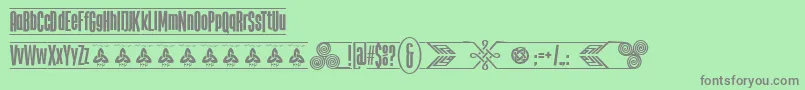 TheTribalBoxDemoFontFfp-fontti – harmaat kirjasimet vihreällä taustalla