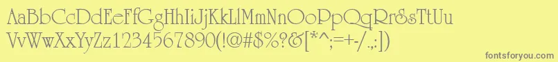 フォントUrsulaRegular – 黄色の背景に灰色の文字