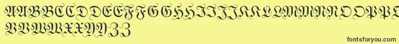 WittewittmajusclesFlourish Font – Black Fonts on Yellow Background