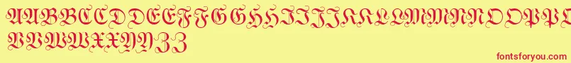 WittewittmajusclesFlourish-fontti – punaiset fontit keltaisella taustalla