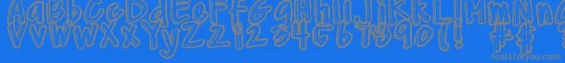 En savoir plus sur la police DjbWornAtTheKnees Police DjbWornAtTheKnees – polices grises sur fond bleu