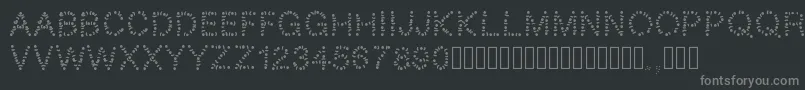 Pwtribe-Schriftart – Graue Schriften auf schwarzem Hintergrund