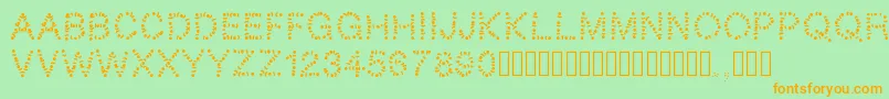 Pwtribe-fontti – oranssit fontit vihreällä taustalla
