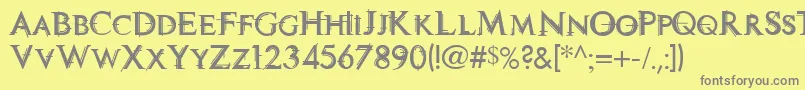 TechnoviaCaps-fontti – harmaat kirjasimet keltaisella taustalla