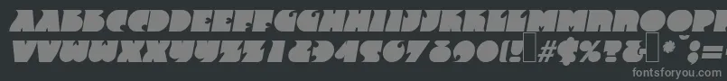 F820DecoBolditalic-fontti – harmaat kirjasimet mustalla taustalla