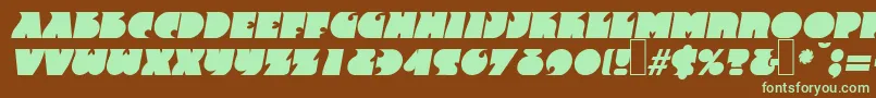 F820DecoBolditalic-fontti – vihreät fontit ruskealla taustalla