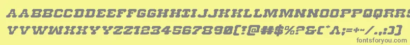 フォントUsmarshalexpandital – 黄色の背景に灰色の文字
