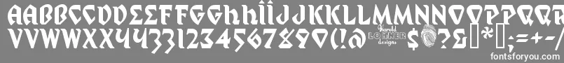 フォントMystp – 灰色の背景に白い文字