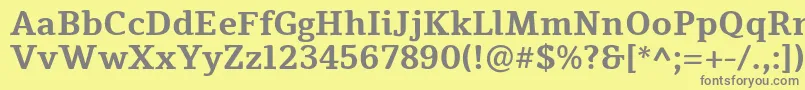 フォントTienneBold – 黄色の背景に灰色の文字