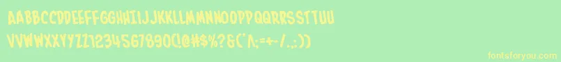 フォントInhouseeditionrotate – 黄色の文字が緑の背景にあります