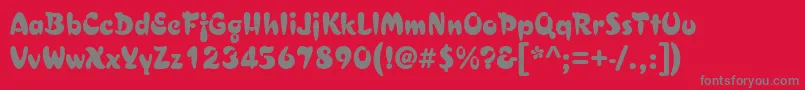 フォントAsylbekm29.Kz – 赤い背景に灰色の文字