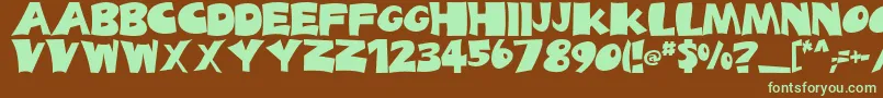 フォントBigTruck – 緑色の文字が茶色の背景にあります。