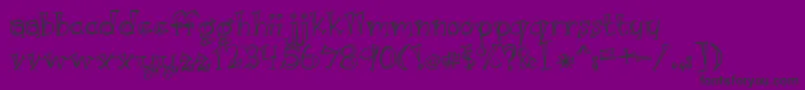 フォントJust Kidding – 紫の背景に黒い文字