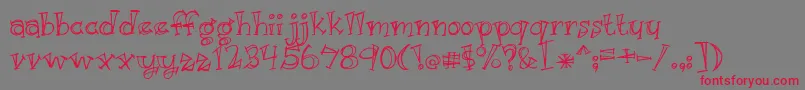 フォントJust Kidding – 赤い文字の灰色の背景