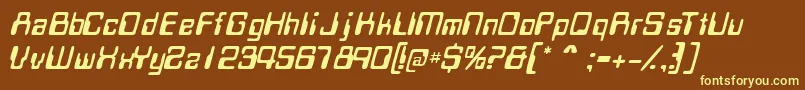 MagcardsskItalic-fontti – keltaiset fontit ruskealla taustalla