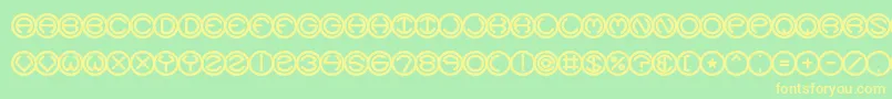 SpheroidsBrk Font – Yellow Fonts on Green Background
