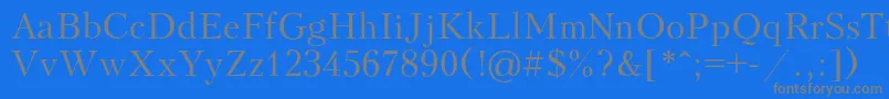 Kudriash Font – Gray Fonts on Blue Background