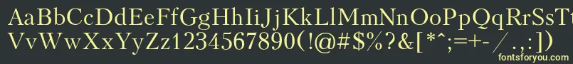 Kudriash Font – Yellow Fonts on Black Background