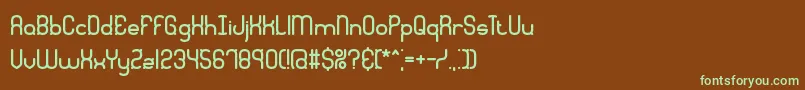 フォントQuadrtic – 緑色の文字が茶色の背景にあります。