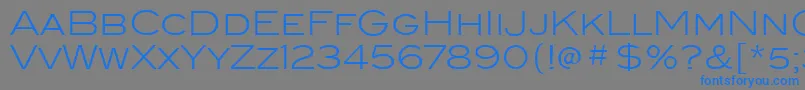 BlairitcTtLight-Schriftart – Blaue Schriften auf grauem Hintergrund