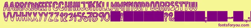 JmhEscamasBlackTop Font – Purple Fonts on Yellow Background