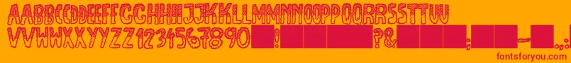 JmhEscamasBlackTop Font – Red Fonts on Orange Background