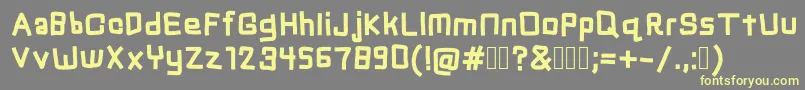 Chuck Font – Yellow Fonts on Gray Background