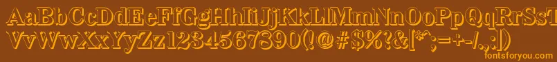 フォントWichitashadowBold – オレンジ色の文字が茶色の背景にあります。