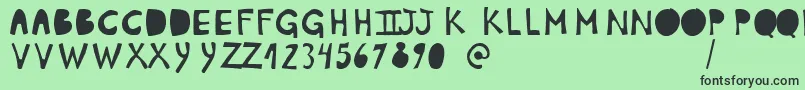 PlumonCp1 Font – Black Fonts on Green Background