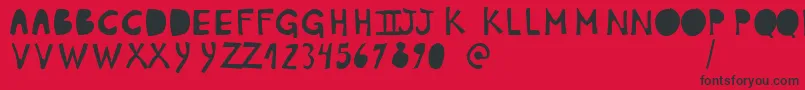 PlumonCp1-Schriftart – Schwarze Schriften auf rotem Hintergrund