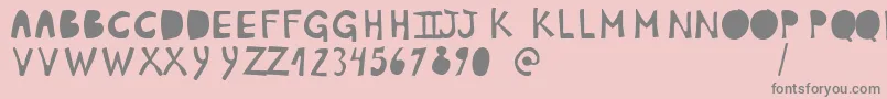 Fonte PlumonCp1 – fontes cinzas em um fundo rosa
