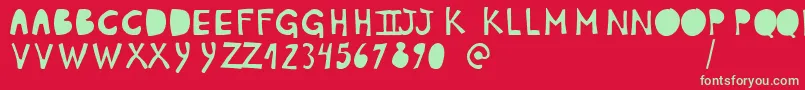 PlumonCp1 Font – Green Fonts on Red Background