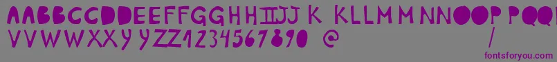 PlumonCp1 Font – Purple Fonts on Gray Background