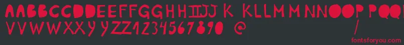 PlumonCp1 Font – Red Fonts on Black Background