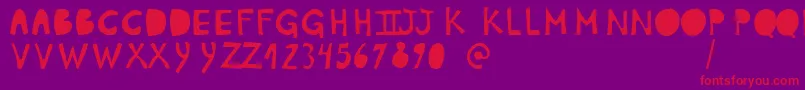 PlumonCp1 Font – Red Fonts on Purple Background