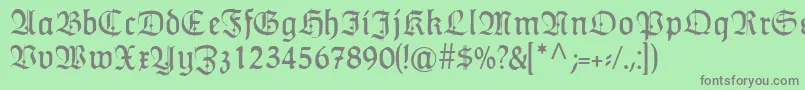 HumboldtfrakturZier Font – Gray Fonts on Green Background