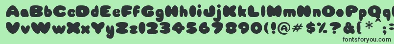 Babycake Font – Black Fonts on Green Background