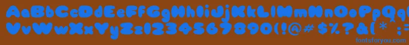 Babycake Font – Blue Fonts on Brown Background