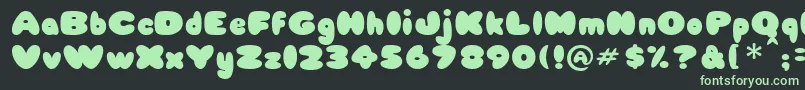 Babycake-fontti – vihreät fontit mustalla taustalla