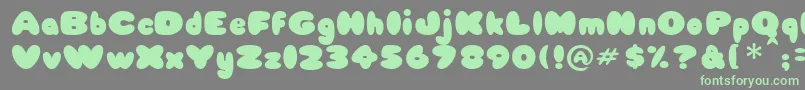 Babycake Font – Green Fonts on Gray Background