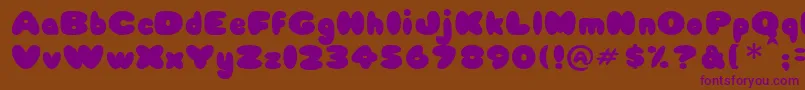 Babycake Font – Purple Fonts on Brown Background