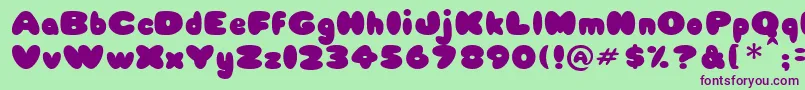 Babycake Font – Purple Fonts on Green Background