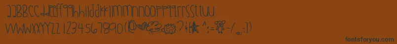 フォントDiamondawareness – 黒い文字が茶色の背景にあります