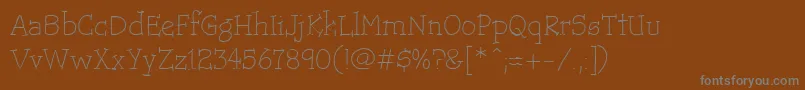フォントTrotsLightHmk – 茶色の背景に灰色の文字