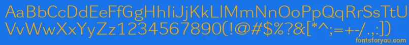 フォントDynagrotesklxe – オレンジ色の文字が青い背景にあります。