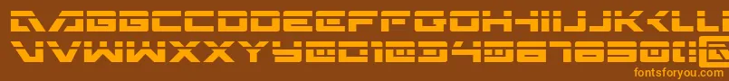 フォントWildcardLaser – オレンジ色の文字が茶色の背景にあります。