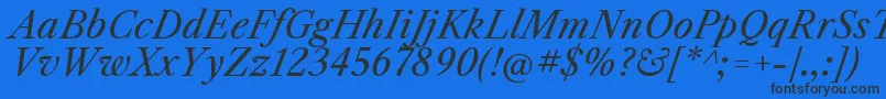 Czcionka LibrecaslontextItalic – czarne czcionki na niebieskim tle