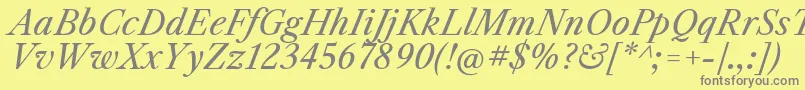 LibrecaslontextItalic Font – Gray Fonts on Yellow Background