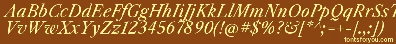 Шрифт LibrecaslontextItalic – жёлтые шрифты на коричневом фоне