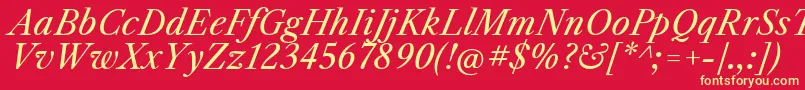 Czcionka LibrecaslontextItalic – żółte czcionki na czerwonym tle